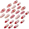 Arte de uñas con temática navideña: Diseños de copos de nieve en tonos nude, rojo y blanco, perfectos para crear un ambiente festivo. Opciones mayoristas disponibles para ventas transfronterizas. Incluye gorro de Navidad y lazo para regalo