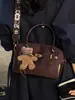 Bolso de Felpa Gamuzada para Mujer 2026 Nuevo de Moda Otoño Versátil Retro Gorpcore para Viaje al Trabajo Bolso de Hombro Cruzado de Mano