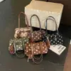 Bolso de axila de lunares retro de estilo coreano para mujer, nuevo bolso de hombro de moda Otoño 2026, bolso baguette para ir al trabajo