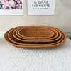 Plato de fruta creativo al por mayor tejido a mano imitación ratán plato de fruta cesta de pan para bocadillos de fruta ovalada cesta de fruta Cesta de fruta tejida de ratán