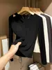 Camiseta Base Hueca de Manga Larga para Mujer Primavera/Otoño 2026, Cuello Redondo Negro, Corte Ajustado, Elegante Camiseta Superior de Estilo Americano Única