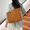 Bolsa de mano impresa de alta calidad para mujer 2026 nueva moderna de moda gran capacidad versátil bandolera única bolsa de viaje texturizada