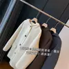 Tela suministrada por el cliente, abrigo de doble cara, lana de alpaca, seda, abrigo con capucha de lana, abrigo corto de lana para mujer L0901Y