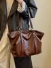 Bolsa feminina retrô de grande capacidade 2026 nova moda tendência versão coreana bolsa tote simples versátil bolsa de ombro para o dia a dia