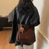 Bolsa de Camurça Retrô Relaxada para Mulheres 2025 Nova Versátil para o Dia a Dia Bolsa de Ombro Transversal Bolsa Tote de Grande Capacidade