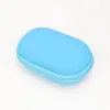 Bolsa de cosméticos para auriculares de EVA Bolsa ovalada para auriculares Caja de almacenamiento para auriculares Bluetooth Caja de embalaje para cargador y cable de datos