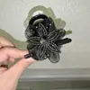 Novo Clip de Flores de Trevo de Cinco Folhas com Rede para Prender Cabelo Presilha para Rabo de Cavalo Clip de Bola Clip para Cabeça Clip de Tubarão Clip de Alta Qualidade para Prender