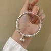 Pulseira de Filigrana Relevo Banhada a Prata Cuproníquel Duas Gerações Feminina Antiga Filigrana Sino Sólida Push-pull Presente de Aniversário