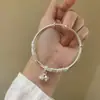 Pulseira de cobre branco banhada a prata com filigrana em relevo para mulheres, pulseira deslizante sólida com sino de filigrana em estilo antigo, presente de aniversário
