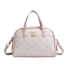 Bolso pequeño encantador y lindo 2026 Boston bolso cruzado lindo de lujo ligero bolso nuevo de nicho estampado para mujer
