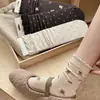 Calcetines de punto de lunares con lazo para otoño e invierno para mujer, calcetines apilados de encaje estilo coreano ins, calcetines versátiles, venta al por mayor desde Zhuji
