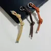 Chaveiro de Personalidade para Carro Enfeites Pendurados Corda de Couro Bolsa de Tempo Pendurada Pequenos Acessórios Pingente de Chaveiro de Couro Tira de Couro Cinto