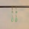 Pendientes con borlas de estilo nacional chino único para mujer, de alta gama, estilo antiguo, 2024, accesorios explosivos para las orejas de cheongsam y hanfu.