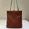 Bolsa de Palha Minimalista para Mulheres 2025 Nova Outono Bolsa de Ombro de Nicho de Luxo Bolsa Tote para o Dia a Dia em Pele de Cabra Importada