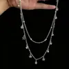 Collar Doble Capa Estrella Borla Circonita Apilable para Mujer Diseño de Nicho Cadena para Clavícula Simple Versátil Nuevo Estilo 2026