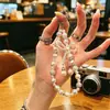Corrente de Cordão com Laço de Pérolas Estilo Ins, Corrente para Celular, Chaveiro, Pingente para Bolsa de Câmera CCD Venda por Atacado em Estoque