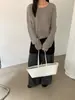 Suéter Tejido Pulóver Color Sólido Cuello Redondo Hueco Holgado Relajado Delgado para Mujer Estilo Nuevo Principios de Otoño 2025 25659