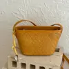 Bolso de cubo tejido de alta gama transfronterizo para mujer, nuevo bolso versátil para el antebrazo 2026, bolso de hombro y bandolera, bolso de trabajo