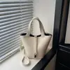 Bolso cubo, diseño de nicho, bolso de mano para mujer, estilo de alta gama, bolso tote pequeño, bolso cruzado de moda para el día a día, bolso texturizado, bolso para mujer