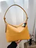 Bolso hobo de cuero suave tejido único para mujer, nuevo modelo de verano 2026, simple y versátil para el trabajo, bolso de mano y bolso de hombro