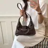 Bolso de hombro de diseño retro de gran capacidad, nuevo, moda europea y americana 2026, color sólido, casual transfronterizo, para hombro y cruzado