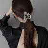 Pinza de metal con garra de calavera, horquilla para el cabello para mujer, diseño nicho de verano, pinza para el cabello para moño en la parte posterior de la cabeza, coleta alta, pinza de tiburón