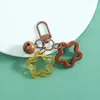 Llavero Colgante de Campana de Estrella de Cinco Puntas Hueca de Colores Kit de Materiales de Cuentas Hechas a Mano DIY Accesorios para Decoración de Orejas