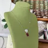 Collar de plata de ley 925 con camelia y corindón rojo para mujer, simple, moderno, lujo ligero, de alta gama, cadena para la clavícula que no se decolora, juego