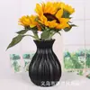 Venta al por mayor de fábrica 2024 Nórdico hidropónico cerámico redondo plástico jarrón arreglo floral decoraciones florales jarrón