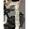 Calça xadrez retrô americana transfronteiriça para homens, novo estilo de verão, calça de perna reta respirável, calça casual com caimento relaxado, moderna