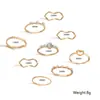 Venta transfronteriza simple anillo nuevo hueco de amor estilo europeo y americano geométrico con forma de ola anillo de 9 piezas