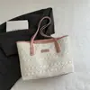 Bolso de mano de diseño nicho casual, bolsa de mano tote de gran capacidad a la moda, nuevo modelo de verano 2026, bolso cruzado simple para mujer