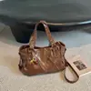 Bolsa Tote Grande de Couro Macio Transfronteiriça Retrô Feminina Outono Europeia e Americana Nicho Bolsa de Ombro Único Transversal Viagem de Curta Distância Tendência