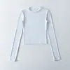 7699-26 Camiseta de manga comprida com gola redonda, corte slim, cintura marcada, estilo básico, coleção de primavera, versão coreana, slim fit, camiseta pequena de gola redonda