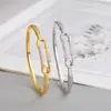 Pulsera Abierta Transfronteriza, Lujo Ligero, Sensación de Alta Gama, Joyería Chapada Europea y Americana, Conjunto de Anillo y Pulsera de Herradura Dorada al por Mayor