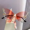 Óculos de sol sem aro de diamante em forma de borboleta transfronteiriça Personalidade da moda feminina Óculos de sol exagerados Europeu e americano Internet Diamante vermelho quebrado