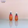 Fabricantes de origen botella de emulsión 30ml40ml botella de vidrio para base de maquillaje cabeza de bomba de pingüino botella dosificadora para esencia