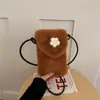 Bolsa de celular versátil de moda outono 2026 transfronteiriça para mulheres, bolsa de ombro fofa de nicho, bolsa transversal de pelúcia