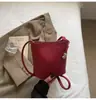 Bolsa de cubo versátil y moderna de verano 2025 para mujer, moda exquisita de alta gama, bolso de hombro, bolso cruzado para el trabajo
