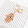 Llavero Corazón de Amor Creativo Ojo del Diablo Incrustado con Diamantes Colgante de Metal Encanto para Bolso Llavero Pequeño Regalo Exquisito
