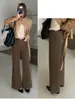 TOP de Otoño estilo Europeo Mercado de los Trece de Guangzhou producto principal: Jeans acampanados versátiles de corte slim con doble bolsillo y cinturón 3135
