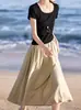 Camiseta Cuadrada de Moda Patchwork Vestido Falso de Dos Piezas para Mujer Verano Nuevo Adelgazante Temperamento de Alta Gama Falda
