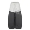 Pantalones de pierna ancha y corte de tijera, patchwork de bloques de color personalizados, diseño creativo de tachuelas digitales, silueta holgada, pantalones largos para hombre, de moda
