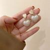 Pendientes de plata con forma de aguja y temperamento de sirena, estilo francés, de alta calidad, al por mayor.