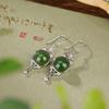 Pendientes de plata de ley Yilu S925 chapados en oro con diseño de jade Hetian retro Ruyi con gancho para la oreja, redondos, elegantes y combinables para mujer