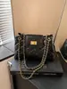 Bolso de mano para mujer 2026 verano nuevo retro con cadena y patrón de diamantes con cierre de candado, bolso cruzado cuadrado pequeño versátil para el trabajo