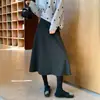 Saia midi de lã cinza super bonita feminina outono 2026 inverno nova cintura alta linha A barra larga saia de lã acetato