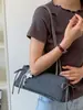 Elegante Bolso Baguette Xiaomi Coreano de Nicho Fresco Dulce Nuevo Otoño Temprano 2026 Bolso de Hombro de Alto Valor Simple para el Trabajo