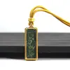 Venta al por mayor del fabricante Arena Mineral Pintada a Mano Acero de Titanio Thangka Zaki Lamu Amarillo Riqueza Mineral Pequeño Thangka Portátil Buda Amuleto Colgante Collar