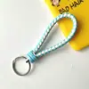 Llavero creativo de cuerda de cuero tejido a mano para pareja, llavero de coche, llavero al por mayor, colgante para bolso